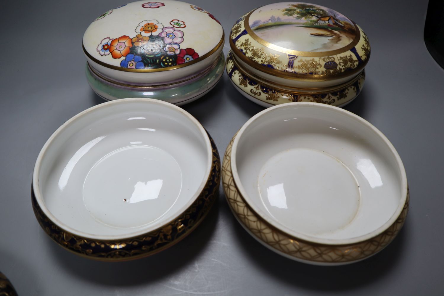 Four Japanese porcelain bowls and covers, two by Noritake, 17cm